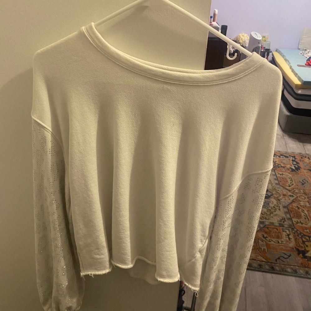 White cheetah print rhinestone cropped hoodie.